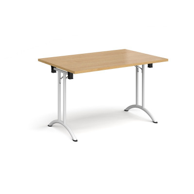 Rectangular folding leg table with white legs and curved foot rails 1200mm x 800mm - oak