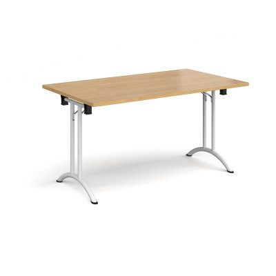 Rectangular folding leg table with white legs and curved foot rails 1400mm x 800mm - oak