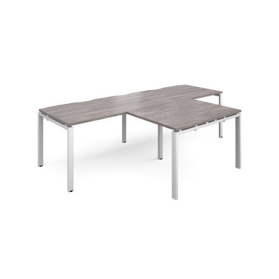 Adapt double straight desks 2800mm x 800mm with 800mm return desks - white frame and grey oak top